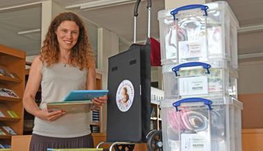 Einen Trolley voll Bücher packen