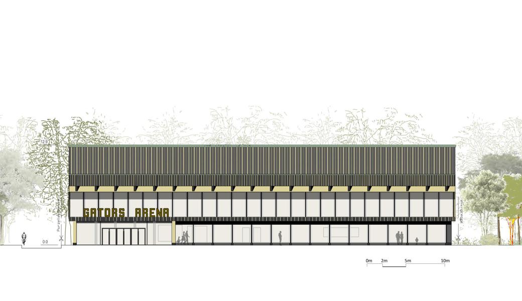 Halle zwischen Bäumen: Frontalansicht der Gators-Arena, Blickrichtung vom Fussballplatz zur Ländernach.