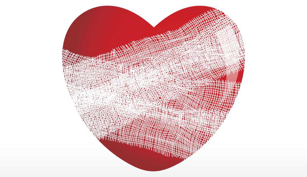 white medical background with red apple wrapped in plaster white medical background with red apple wrapped in plaster