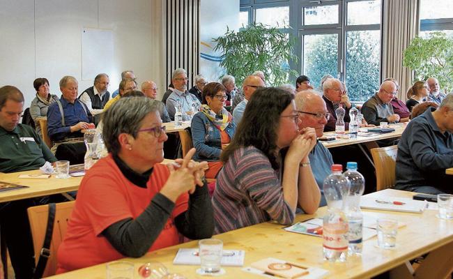Im Zentrum das Aktionsrad mit dem Kolping-Logo «Zeit schenken»